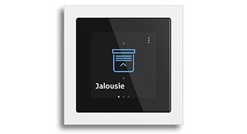 Eine Familie kocht gemeinsam in einer modernen Küche, lacht und genießt die Zeit miteinander.